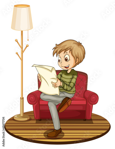 Boy reading newspaper