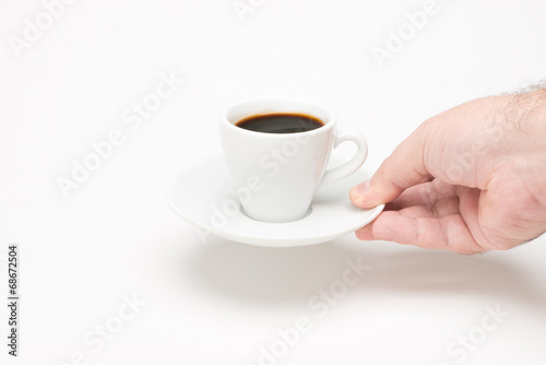 Cup of coffee with hand