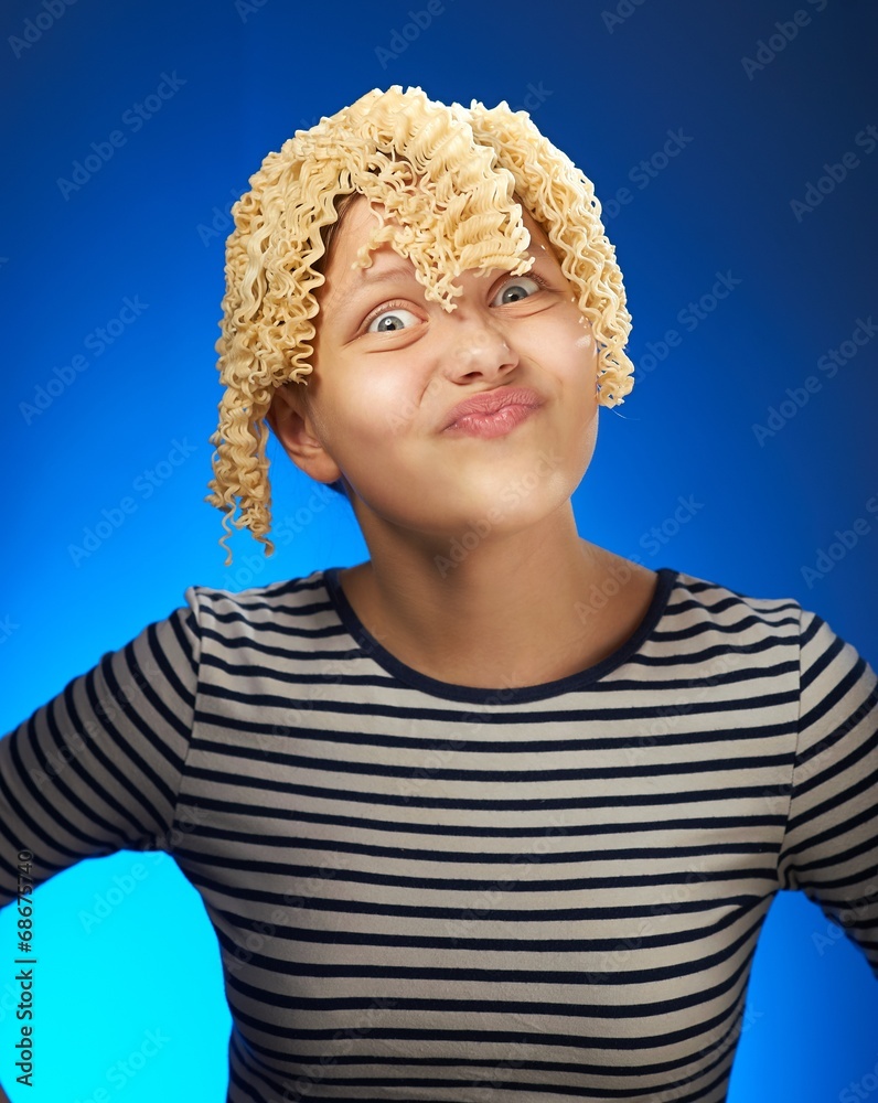 Funny teen girl with macaroni instead hair