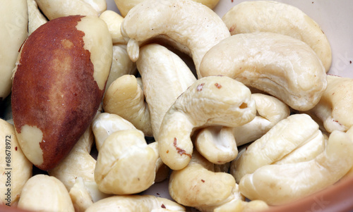 variety of tasty nuts in a brown bowl