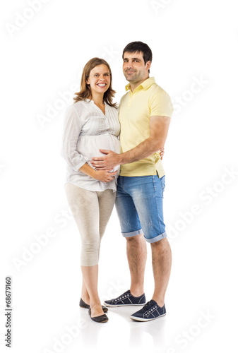 Pregnant couple in studio