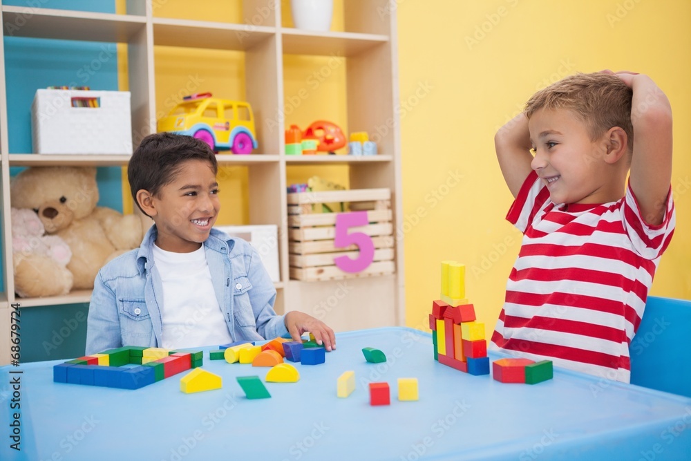 Cute little boys playing with building blocks Cute little boys playing with building blocks