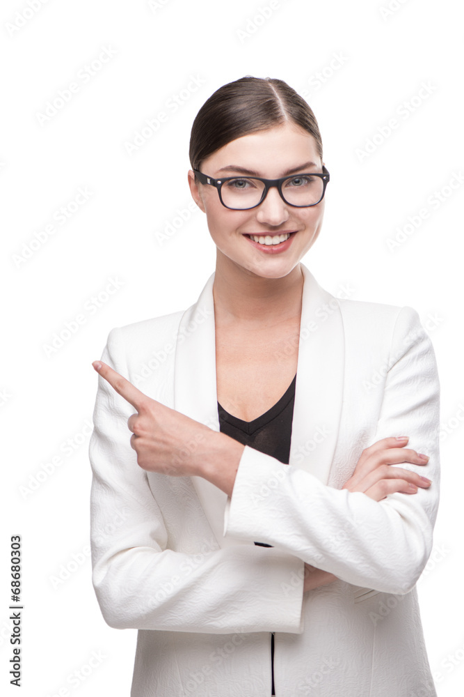 Beautiful business woman with glasses smiling and pointing Beautiful business woman with glasses smiling and pointing