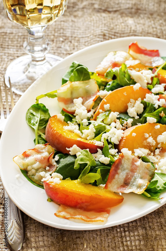 salad with peaches, bacon; arugula, spinach and goat cheese