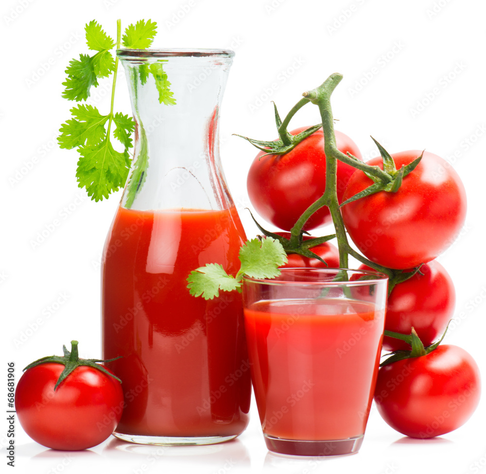 Wall Mural Bottle and glass of tomato juice and ripe tomatoes.