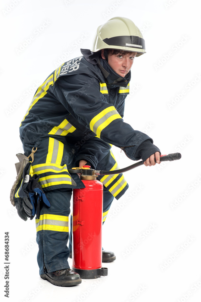 Feuerwehrfrau mit Feuerlöscher Feuerwehrfrau mit Feuerlöscher