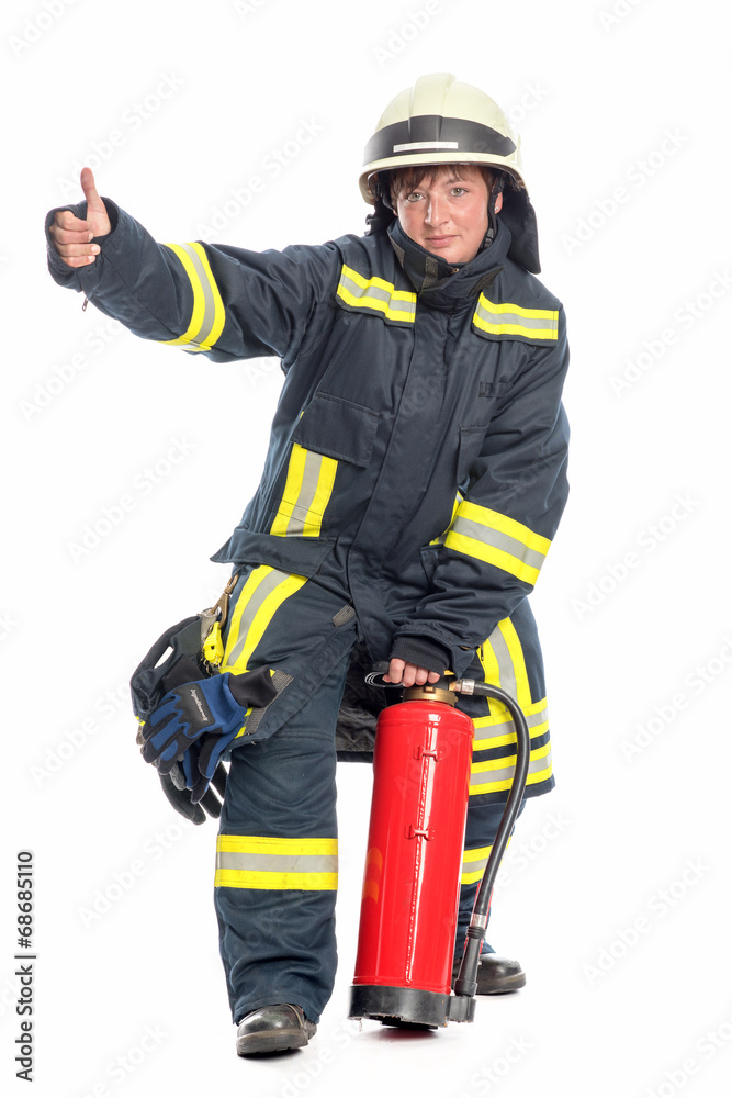 Feuerwehrfrau zeigt Daumen hoch Feuerwehrfrau zeigt Daumen hoch
