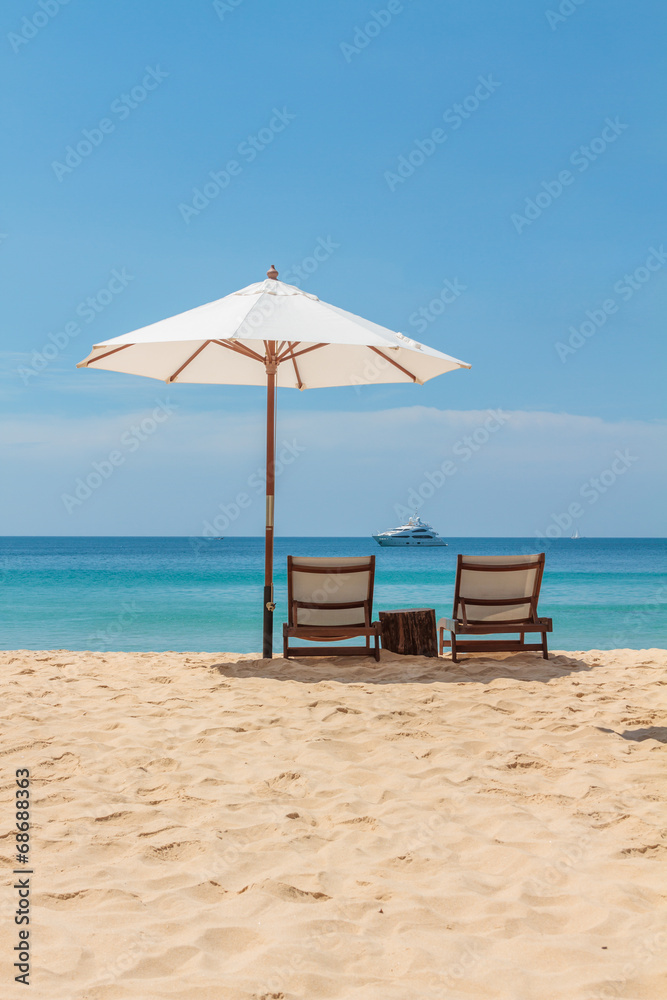 Sunbeds and umbrella on Freedom beach Koh Phuket