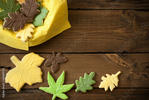 Autumn Cookies on Wooden Background photo