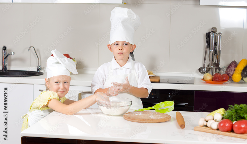 Cute Little Chefs Baking in Kitchen Cute Little Chefs Baking in Kitchen