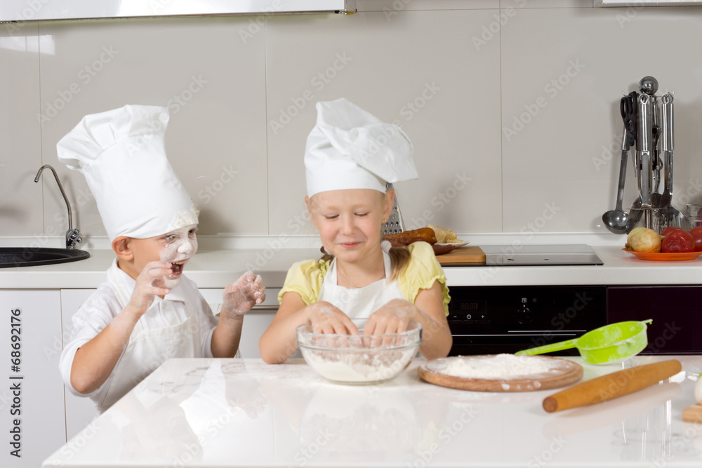 Cute Kid Chefs Baking While Playing Cute Kid Chefs Baking While Playing