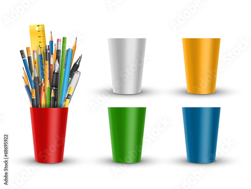 Pen and pencils in glass