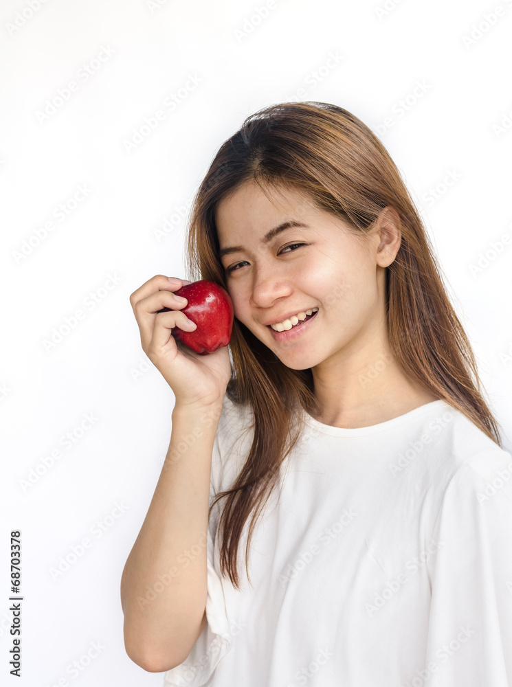 young woman holding an apple. young woman holding an apple.