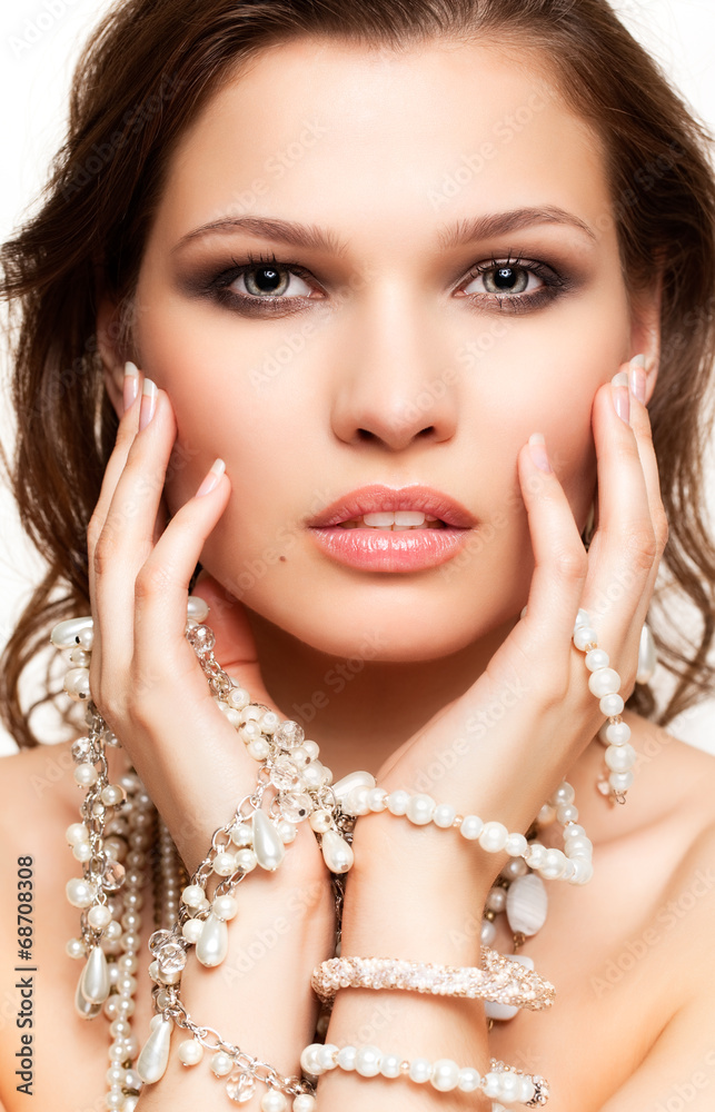 Beautiful young woman in necklace Beautiful young woman in necklace