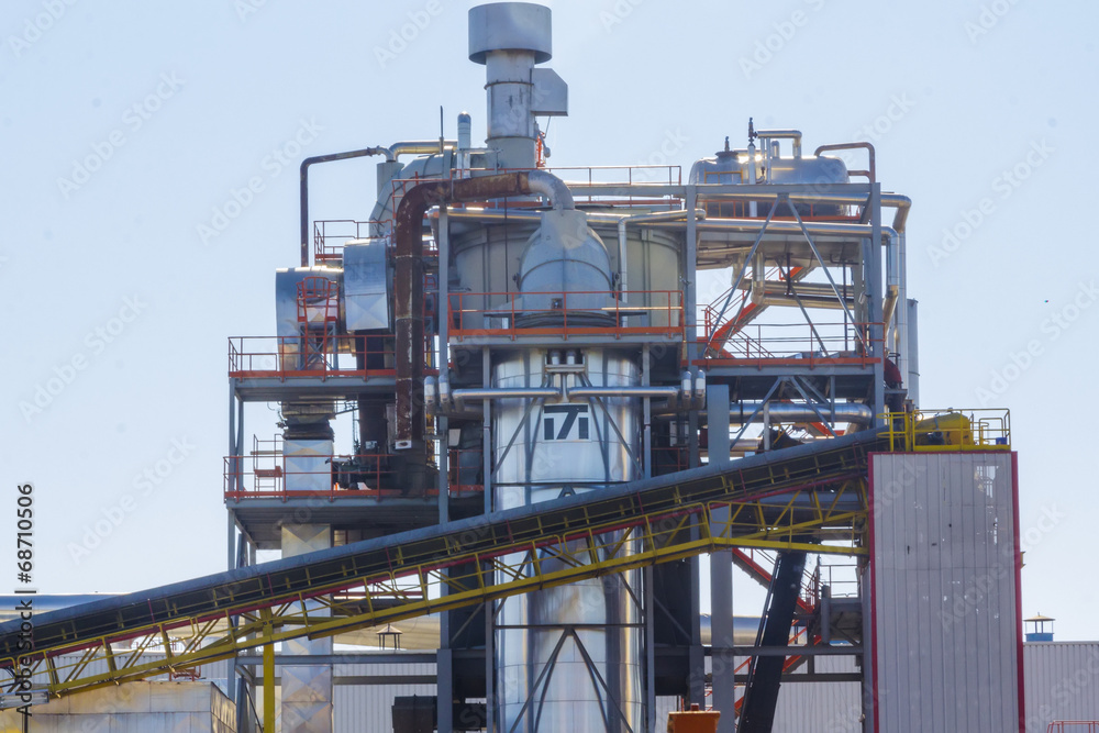 metal deposits and a small factory chimneys