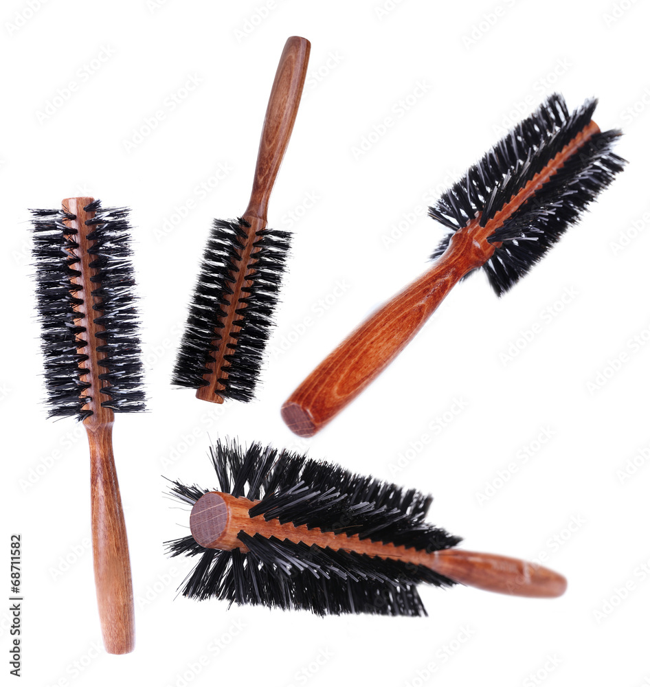 Collage of wooden hairbrushes isolated on white Collage of wooden hairbrushes isolated on white