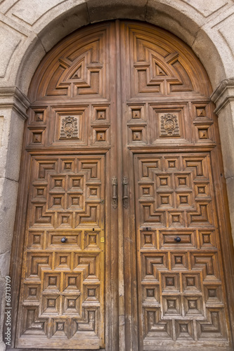 Typical wooden door entrance to Catholic churches © james633