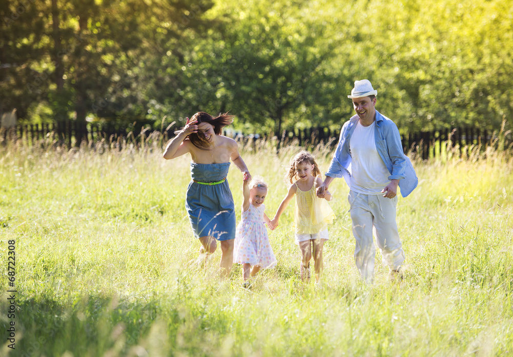 Obraz premium Happy family in nature