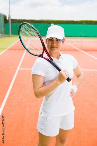 Pretty tennis player smiling at camera © WavebreakmediaMicro