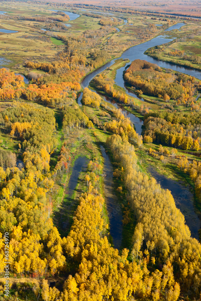 Top view of the flood-land of river in autumn