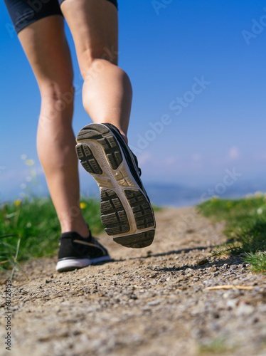 Legs and shoes of a woman jogger