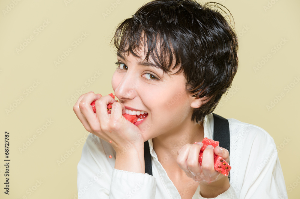 Attractive female enjoying watermelon, healthy diet concept Attractive female enjoying watermelon, healthy diet concept
