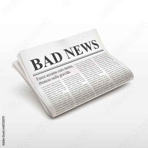 bad news words on newspaper