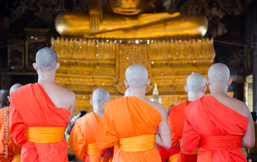 Photography Group of Buddhism monks at Wat Suthat in Bangkok ,Thailand