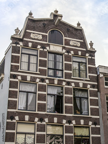 Amsterdam, Netherlands. A typical facade of the old houses photo