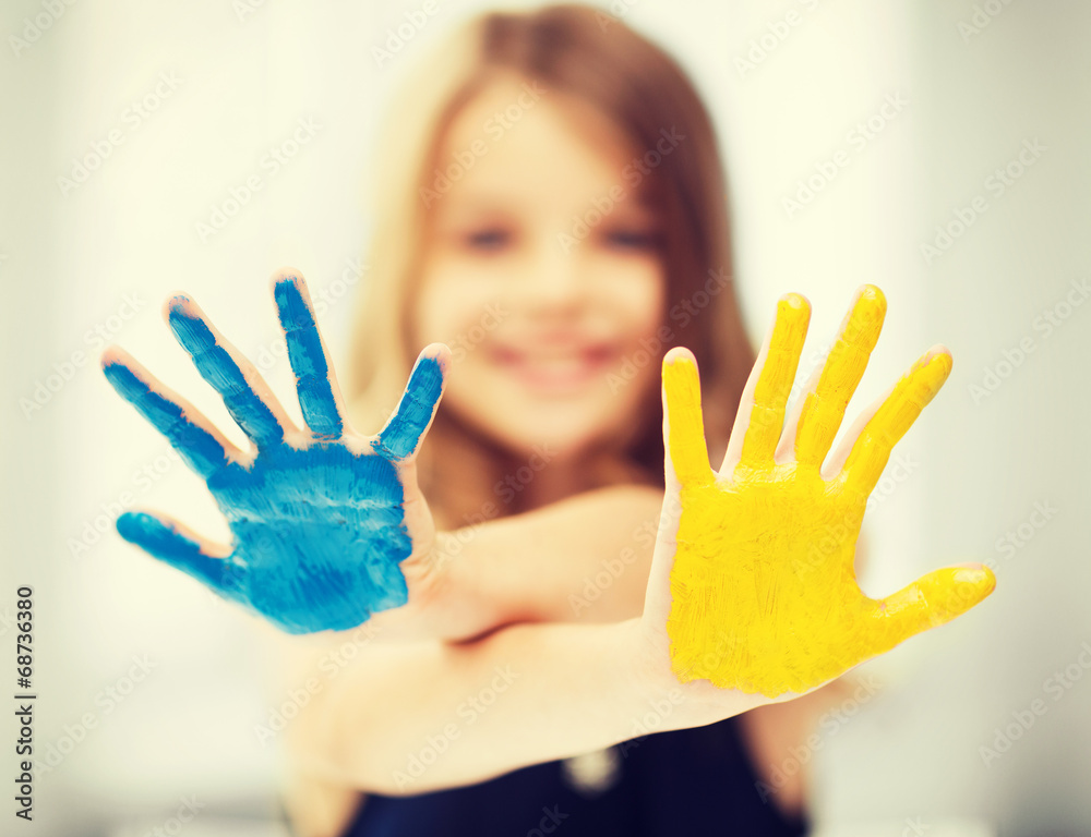 © Syda Productions - girl showing painted hands © Syda Productions - girl showing painted hands