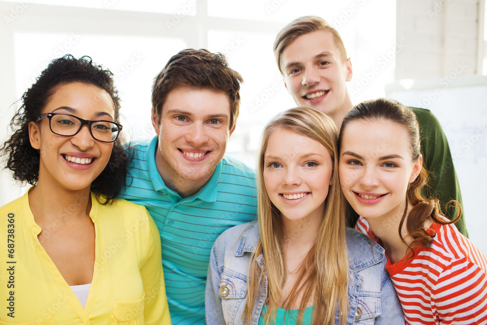 group of smiling people at school or home group of smiling people at school or home