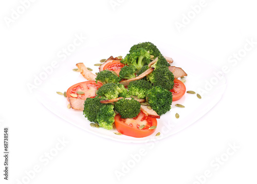 Broccoli salad with ham and pumpkin seeds.