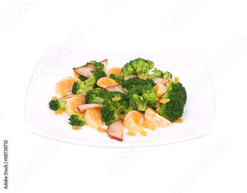 Broccoli salad with smoked ham and orange.