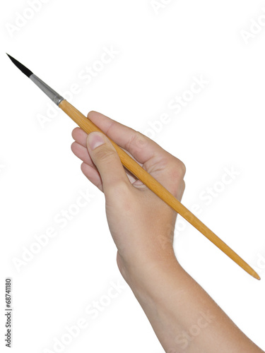 Pinsel in der Hand