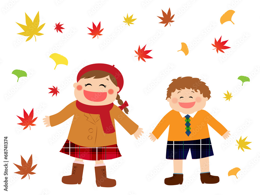 A girl and a boy standing happily in autumn leaves A girl and a boy standing happily in autumn leaves