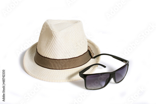white hat and black sunglasses