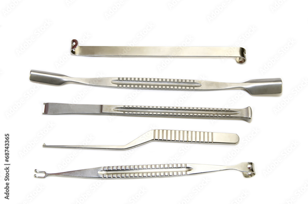 steel surgical instruments on a white background steel surgical instruments on a white background