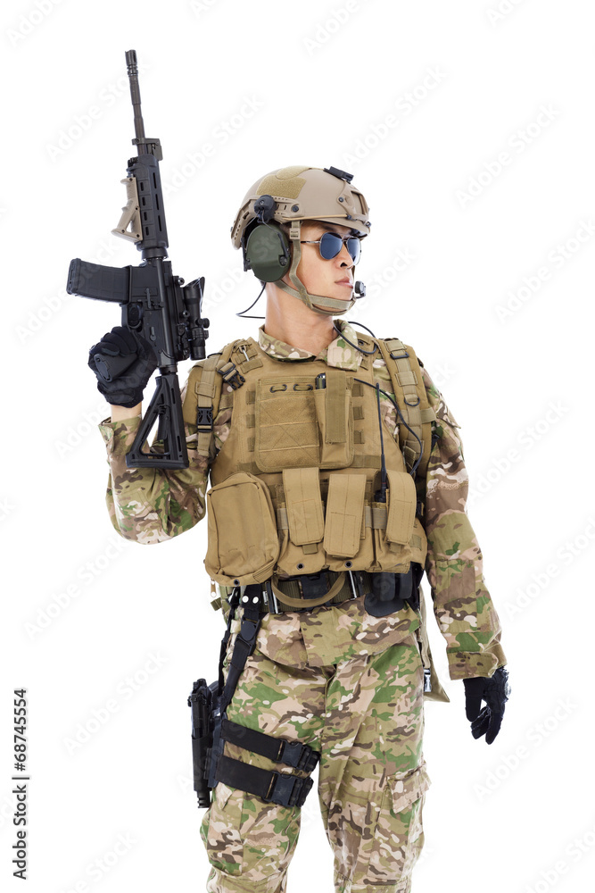 Fototapeta premium Soldier raising up rifle or sniper with white background