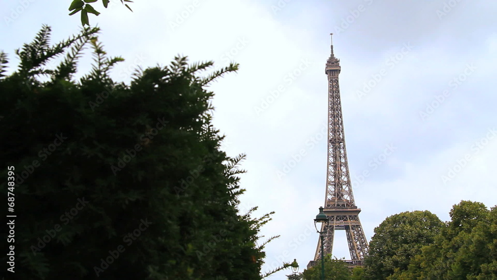 Eiffel tower tracking shot in summer, Paris, France. Find simila Eiffel tower tracking shot in summer, Paris, France. Find simila
