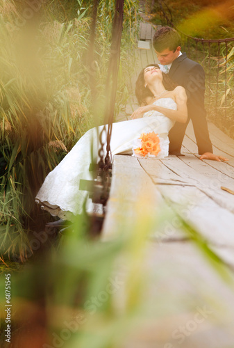 young wedding couple, beautiful bride with goom portrait on the photo