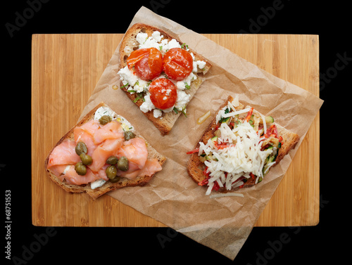 Three sandwiches on platter