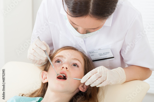 Girl Undergoing Dental Treatment