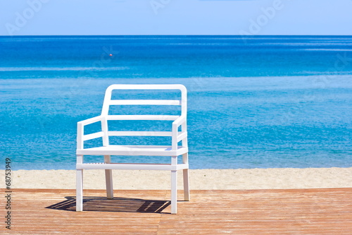 Plastic chair on the beach