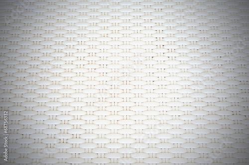 White cream plastic surface with repeating pattern.