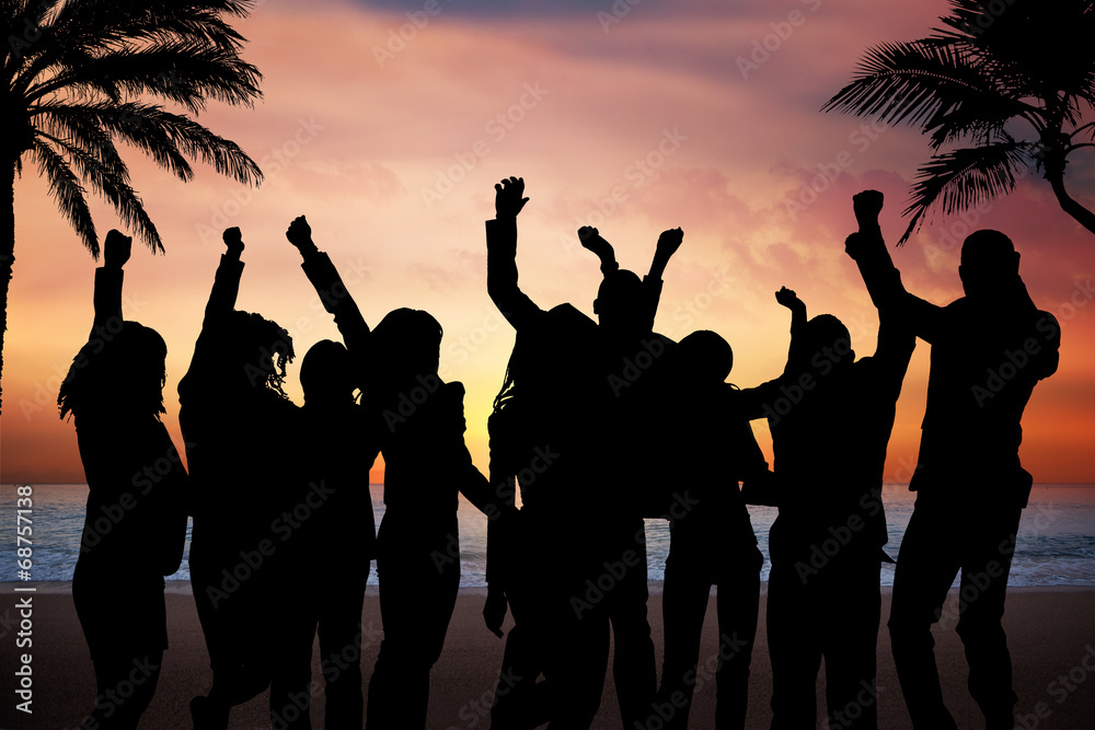 People Partying On Beach At Sunset