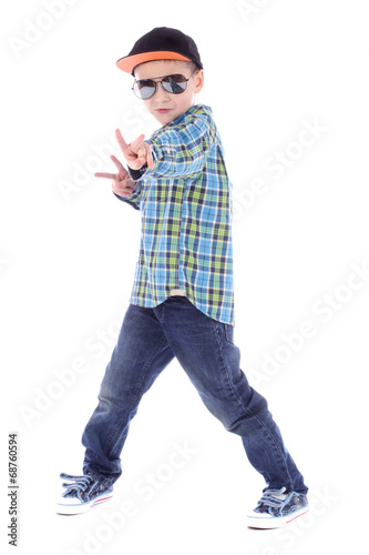 Full length portrait of smiling little boy in jeans cup and sung