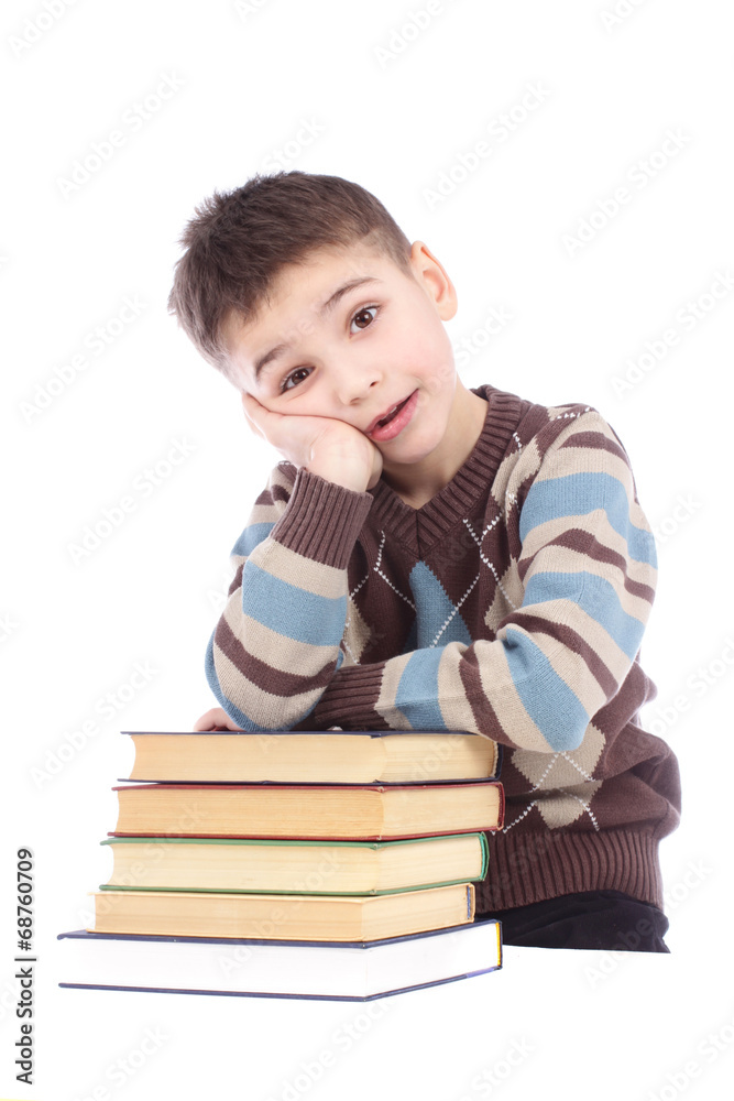 Young boy with books isolated over white background Young boy with books isolated over white background