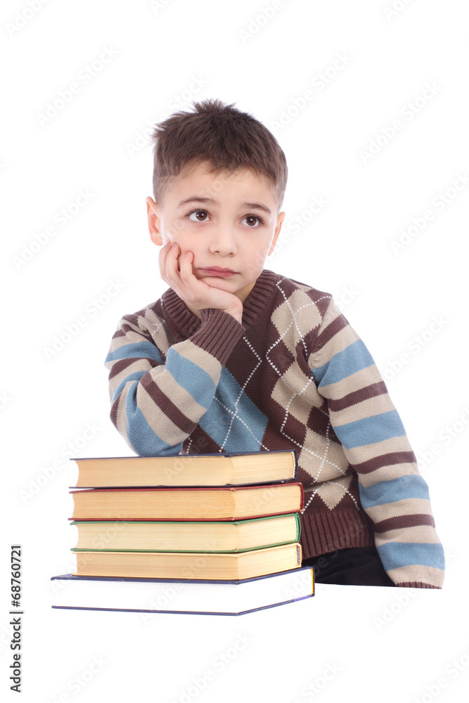 Photo of young boy with books isolated over white background Photo of young boy with books isolated over white background