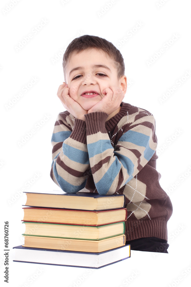 Young boy with books isolated over white background Young boy with books isolated over white background