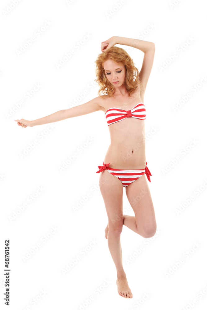 Young woman with slim body in swimsuit isolated on white Young woman with slim body in swimsuit isolated on white